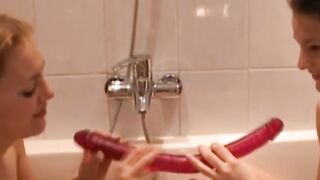 Dutch Lesbians Using Pink Dildos Arousing Each Other