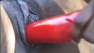 Ebony chicks are doing each other's pussies with dildos