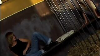 Hot blonde and brunette get horny while in jail and fuck with a strap on - 2 image