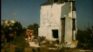 Tanned beauty with juicy pink pussy gets licked in sand on beach - 1 image