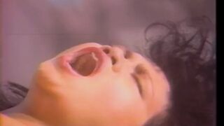 Asian slut and white MILF fuck with a toy in the sauna