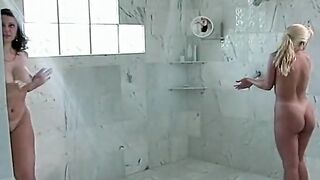 Two lesbian schoolgirls indulge their pussies in the shower - 6 image