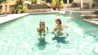 Hot babes tease each other in the swimming pool - 4 image