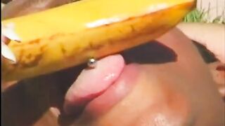 Naughty babe rubs banana on her tits while getting eaten out - 11 image