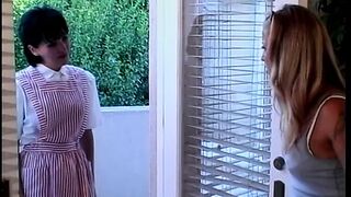 Blonde lesbian and her brunette girlfriend play on the bed - 1 image