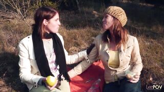 Sharing a gentle kiss outdoors the lesbian couple gets heated and they take out their strapon - 2 image