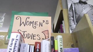 librarian fingers a student's pussy between the bookshelves - 5 image