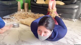 Bossy Girl Hogties And Gags Barefoot Roommate with Rope, Duct Tape and Pantyhose Encasement - 13 image
