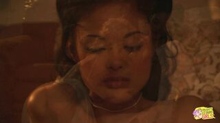 They get sentimental and start kissing on the couch and caress each others small tits