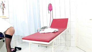 Nylon Nurse investigate patient with enema, speculum and fisting with her latex gloves - 12 image