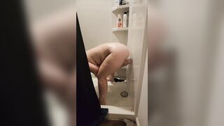 Milf fucks her toy in the shiwer while hubby works - 11 image