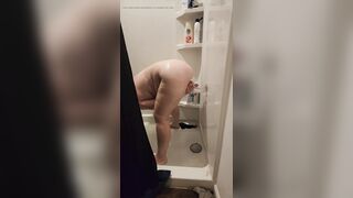 Milf fucks her toy in the shiwer while hubby works - 9 image