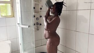 Thick African Lesbians in the bathroom using a big dildo in their tight pussies and amazing behind the scene telling how much - 8 image
