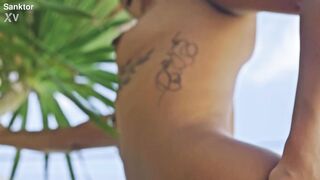 SANKTOR - SHAVED HEAD LESBIAN MASTURBATES IN THE SWIMMING POOL
