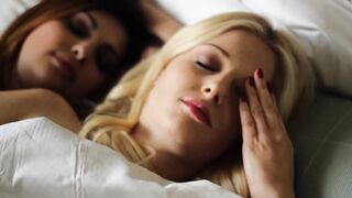 Watch Roxy Lotus and Charlotte Stokely cum hard while licking each other's wet pussies - 1 image