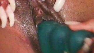 Four ebony lesbians fuck their wet cunts with toys - 13 image